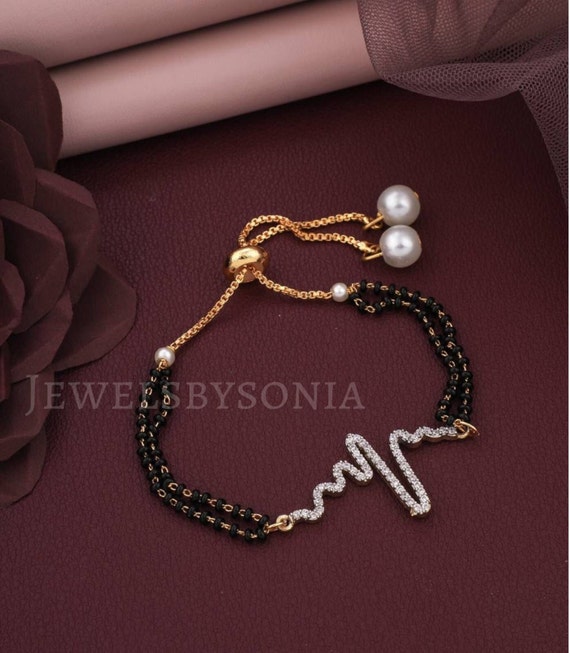 Gold Polish Mangalsutra Adjustable Bracelet Design as Per Availability