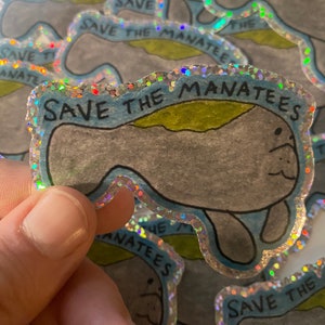Adesivo de arte original GLITTER “Salve os peixes-boi”