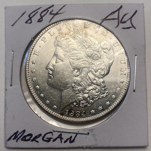 1884 Morgan Dollar Graded AU58