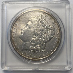 1889 Morgan Dollar AU 58