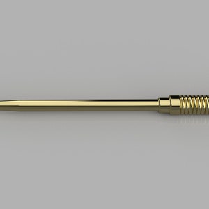 Peut inclure: Un outil en m&eacute;tal dor&eacute; avec une pointe pointue et une poign&eacute;e enroul&eacute;e avec un anneau &agrave; l'extr&eacute;mit&eacute;.
