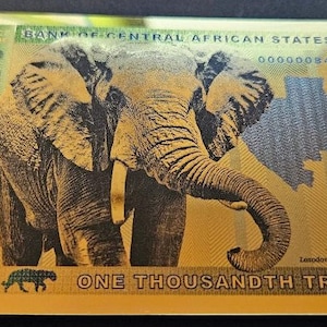 Die 1 Cedi Goldnote Aurum®-Technologie der Republik Ghana. &quot;Diese Note ist eine Hommage an das &quot;&quot;Cedi&quot;&quot; oder Muschelgeld, die Form der Währung.&quot;