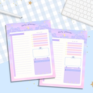 May include: Two printable daily planner pages with a pastel purple, pink, and blue gradient background. The pages feature a moon and stars with clouds and the text "daily planner". Each page has a to-do list, a notes section, and a "what are you grateful for" section.