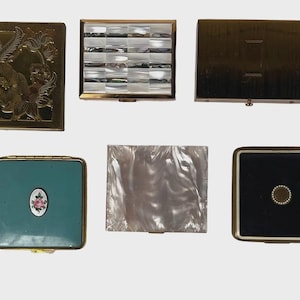 May include: A set of three ceramic mugs with a speckled, matte finish. The mugs are in shades of cream, light gray, and dark gray. Each mug has a simple, modern design and a rounded handle.