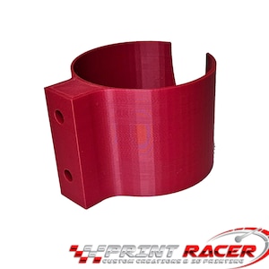 May include: A red 3D printed cup holder with two holes on the side. The holder is designed to be mounted on a wall or surface.