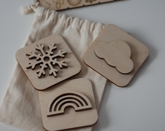 Wooden sand stamp with weather symbols, handmade