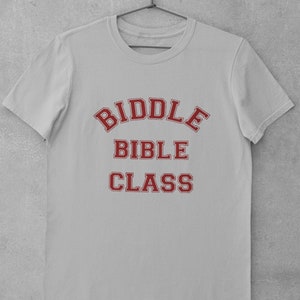 May include: A gray t-shirt with the text "BIDDLE BIBLE CLASS" in red.