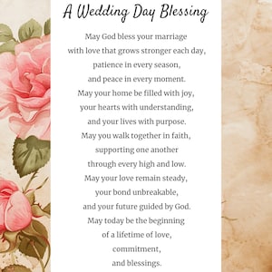 May include: A wedding day blessing card with a floral border of pink roses and green leaves. The text includes a wedding blessing with wishes for love, joy, and a lifetime of commitment.
