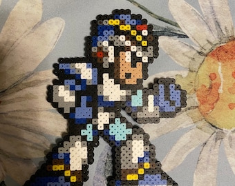 May include: A blue and white pixel art character with a yellow helmet and a black background. The character is standing with its arms outstretched.