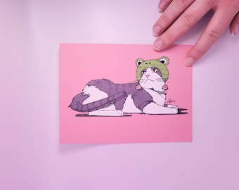 Cute Cat Art Print - Cat In a Frog Hat Sticker