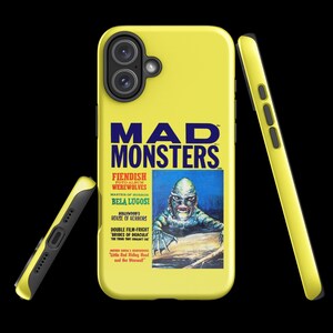 May include: A yellow phone case with a vintage monster movie poster design. The poster features a creature from the black lagoon and the text "Mad Monsters".