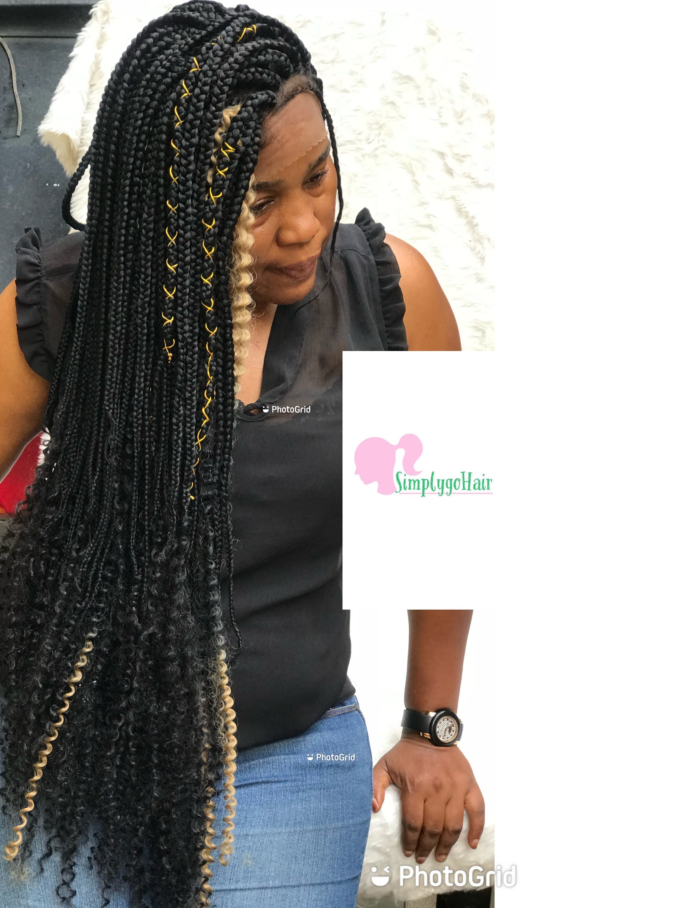 Medium sized box braids goddess braids.