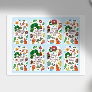 May include: Eight colorful gift tags featuring the Very Hungry Caterpillar. Each tag has a different design with the text "Thank You!" or "Thank You for inching by!"