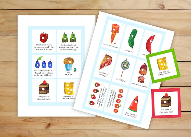 May include: A set of colorful cards featuring illustrations of different foods, including an apple, pears, plums, a cupcake, a piece of chocolate cake, a slice of Swiss cheese, an ice cream cone, a pickle, a hot dog, a slice of cherry pie, a lollipop, a slice of salami, strawberries, and a slice of watermelon. The cards have text on them describing the food and the day of the week.