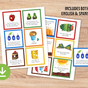May include: Colorful educational cards featuring illustrations of food items and a caterpillar, with text in both English and Spanish. The cards depict various foods like apples, pears, and cake, with the text "INCLUDES BOTH ENGLISH & SPANISH!"