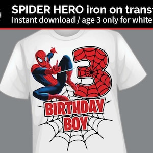 May include: White t-shirt featuring a Spider-Man graphic with the number 3 in a red spiderweb design. The text "BIRTHDAY BOY" is below the number. The shirt is for age 3.