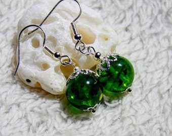 Delicate earrings in bright emerald green, made from epoxy and glass