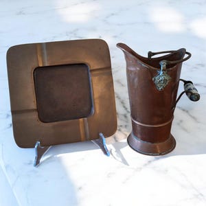 Copper Bucket and Brass Ashtray.