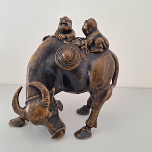 Children Riding Bull, Bronze