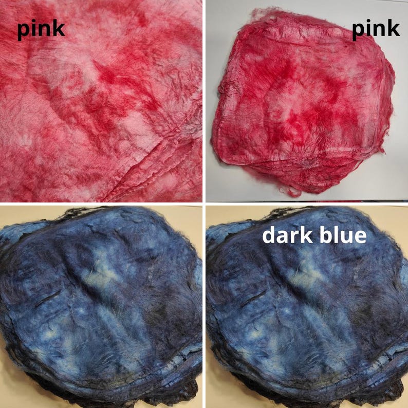 May include: Two pieces of fabric, one pink and one dark blue, are shown in a close-up. The fabric is folded and appears to be hand-dyed.