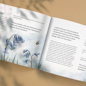 May include: An open book with bluebells and a bee on the cover. The text on the page reads "I wish I'd known that it doesn't always mean immediate sadness. I remember feeling bad for smiling and being happy about other things after he had died."