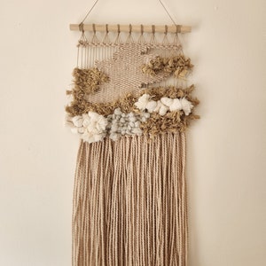 Rugged beach tones woven wall hanging