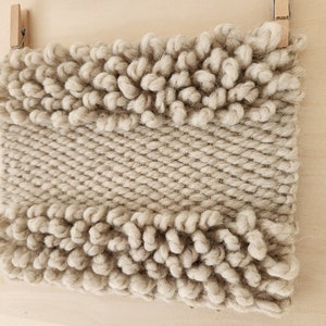 Greige mounted wall hanging