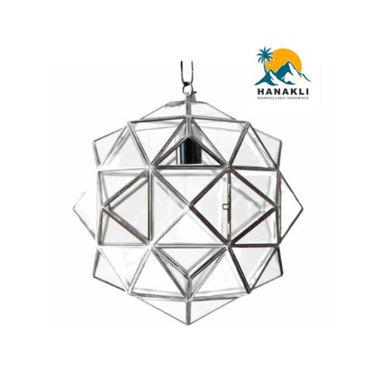 May include: A silver geometric glass pendant light fixture with a clear glass shade. The light fixture is hanging from a silver chain.