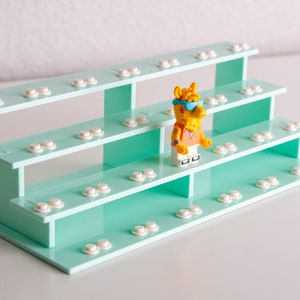 Minifigurenstandaard - biedt plaats aan 26 figuren. Mintkleur