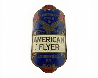Antique American Flyer Bicycle Head Badge Louisville KY 1900s Tin Litho Original