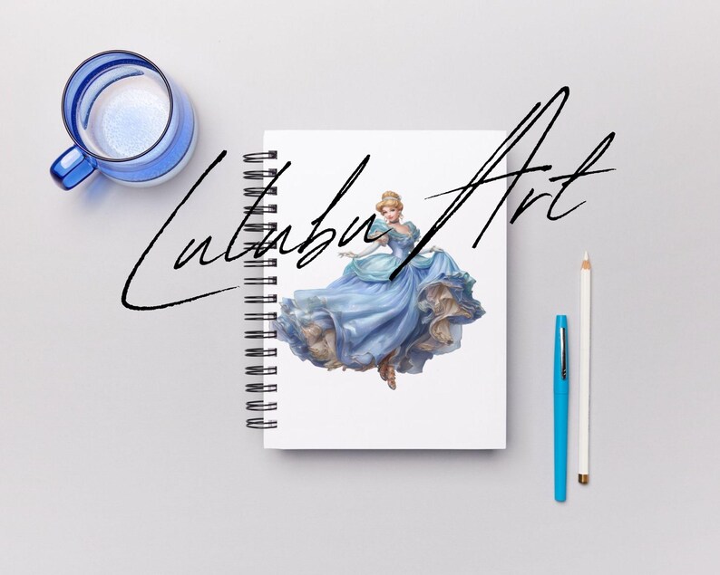 May include: A spiral-bound notebook with a princess illustration in a blue gown. The notebook is on a gray surface, with a blue glass mug, a blue pen, and a white pencil. The notebook has the text "Lutubu Art" in black script.