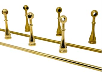 Rail basculant en laiton