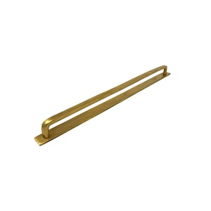 May include: A gold-toned metal cabinet pull with a rectangular base and a curved top.