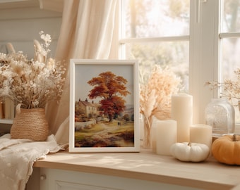 May include: A framed landscape painting depicts a tree with vibrant orange and red leaves, a house, and a path. The painting is displayed on a wooden surface with candles, pumpkins, and dried flowers. The scene is set near a window.