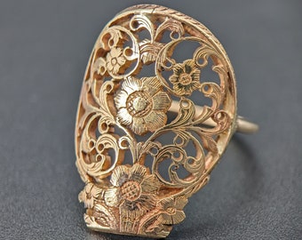Gold ring remodeled from the balance bridge of an 18th century verge fusee pocket watch