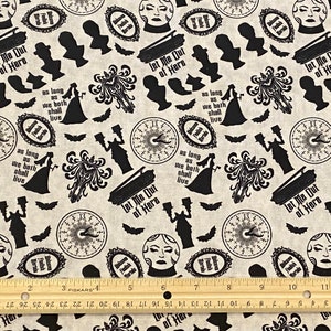May include: Black and white fabric with a repeating pattern of a clock, a coffin, a woman in a gown, a skull, a bat, and the text "Let Me Out of Here".