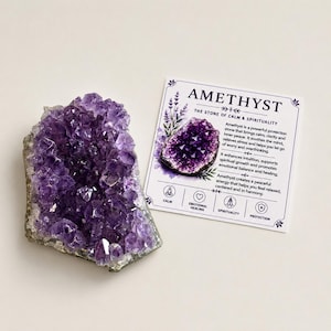 May include: A raw, deep purple amethyst crystal cluster next to a square white information card. The card features the text AMETHYST, THE STONE OF CALM & SPIRITUALITY, along with a small image of the crystal and icons for calm, healing, spirituality, and protection.