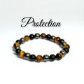 Protection Bracelet. Black Onyx - Tiger's Eye - Hematite. Healing Crystal Bracelet. Stretch