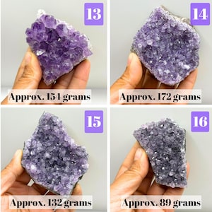 May include: Four amethyst crystal clusters labeled 13, 14, 15, and 16. Number 13 weighs approx. 154 grams, 14 weighs approx. 172 grams, 15 weighs approx. 132 grams, and 16 weighs approx. 89 grams. Each piece features deep purple, jagged points.