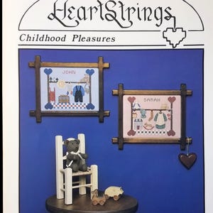 May include: A set of three ceramic mugs with a speckled, matte finish. Each mug features a different color: light blue, cream, and gray. The mugs have a simple, modern design with a rounded shape and a comfortable handle.