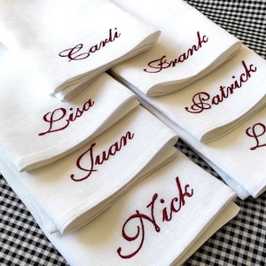Add a touch of elegance to your table with these personalized linen napkins, beautifully embroidered with custom names. Perfect for weddings, special dinners, and formal gatherings, they bring charm and sophistication to any setting. Made from high-quality linen, they make a thoughtful wedding or housewarming gift. Choose your name and thread color for a unique, timeless look!