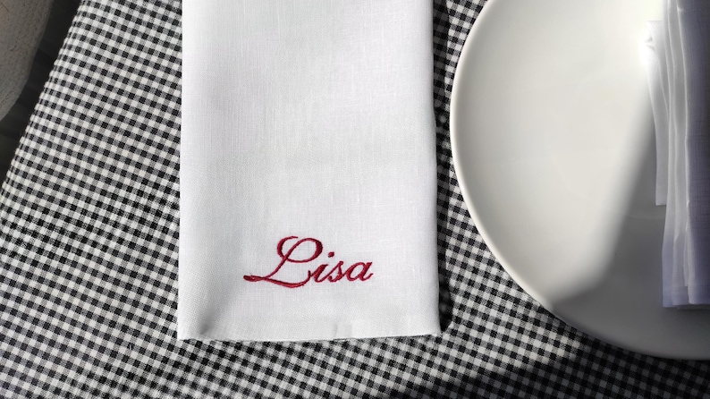 Elevate your table setting with these elegant custom linen napkins, embroidered with names in a refined script. Perfect for weddings, dinner parties, and special occasions, they add a personal touch to any gathering. Made from premium linen, they make a sophisticated wedding or housewarming gift. Customize with your chosen name and thread color for a unique, timeless look!