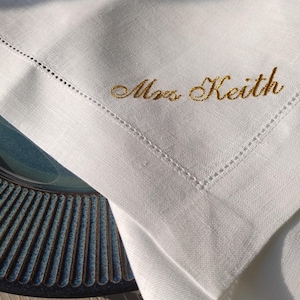 Add a touch of elegance to your table with these personalized linen napkins, beautifully embroidered with custom names. Perfect for weddings, special dinners, and formal gatherings, they bring charm and sophistication to any setting. Made from high-quality linen, they make a thoughtful wedding or housewarming gift. Choose your name and thread color for a unique, timeless look!