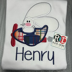 Easter bunny flying a plane shirt or bodysuit! Can be personalized!