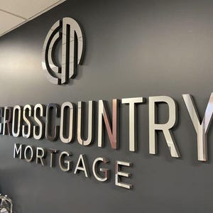 Stainless steel logos and lettering suitable for indoor and outdoor use.