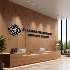 3D logo wall sign made with polished or brushed metal for a custom lobby sign in stainless metal on a dark wall in a modern conference room