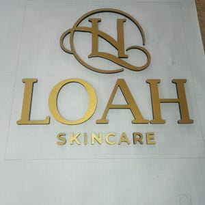 Stainless steel logos and lettering suitable for indoor and outdoor use.
