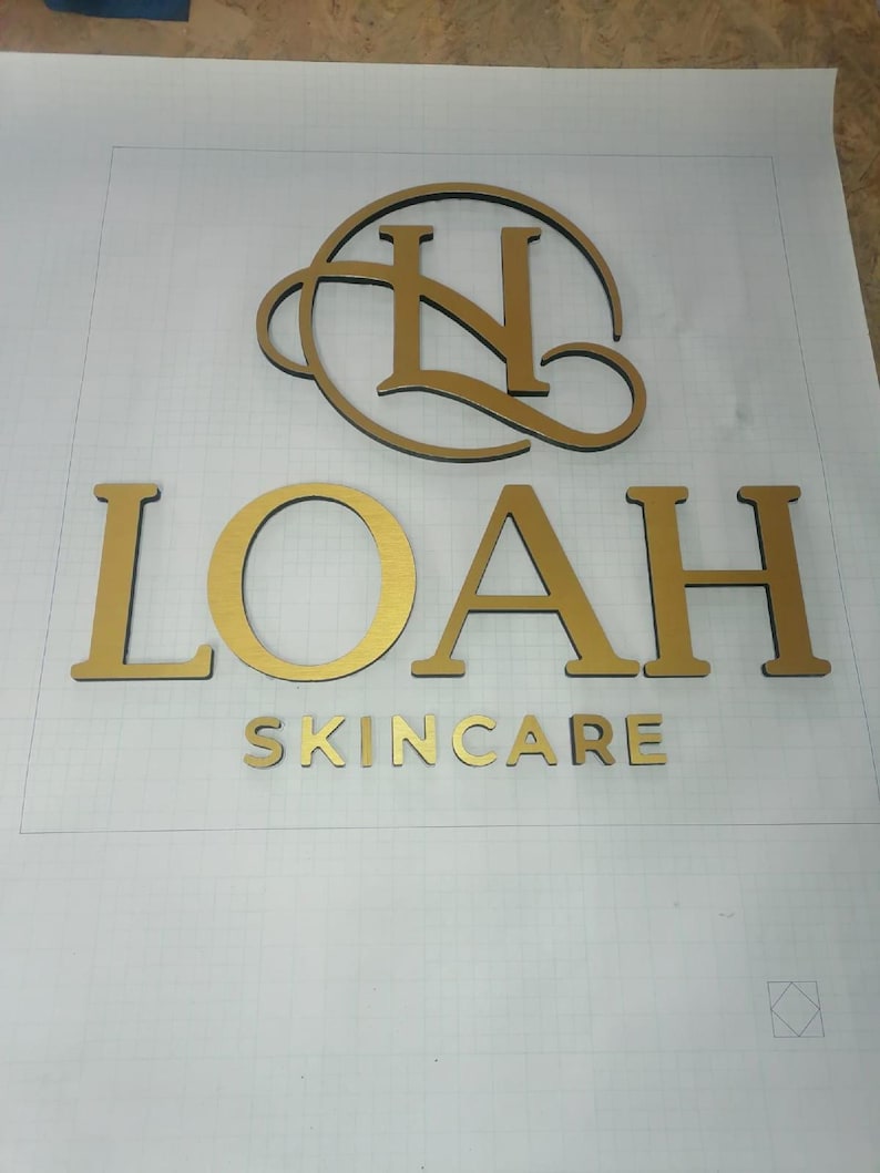 Stainless steel logos and lettering suitable for indoor and outdoor use.