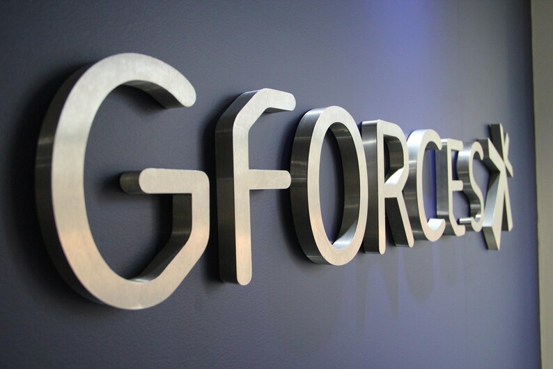 Stainless steel logos and lettering suitable for indoor and outdoor use.