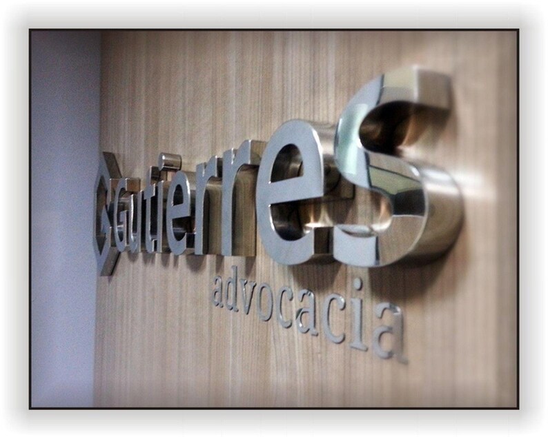 Stainless steel logos and lettering suitable for indoor and outdoor use.